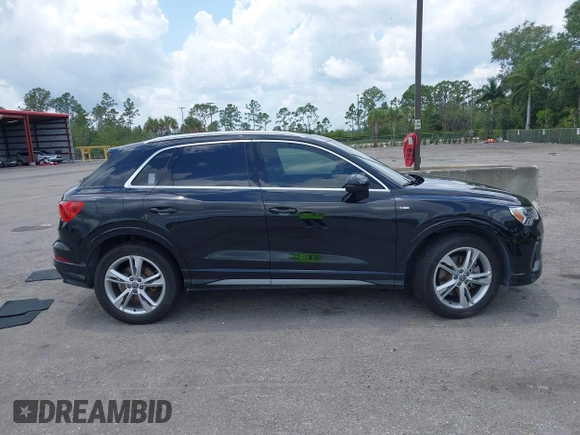 2020 Audi Q3 S line Premium Plus with VIN WA1EECF33L1052774, listed as a IAAI auction lot 42199200 with 55,008 mi miles and . Bid and sale history available at DreamBid. Image 13.