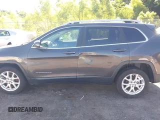 2016 Jeep Cherokee Latitude z VIN 1C4PJLCB6GW159039, wystawiony jako IAAI lot #42274817 z przebiegiem 136 269 mil mil oraz . Historia ofert i sprzedaży dostępna na DreamBid. Obrazek 15.