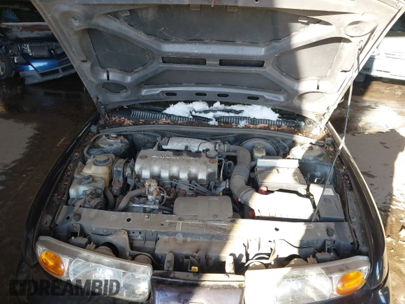 2000 Saturn SL with VIN 1G8ZH5282YZ214070, listed as a IAAI auction lot 41537546 with 94,319 mi miles. Bid and sale history available at carsss.com. Image 10.