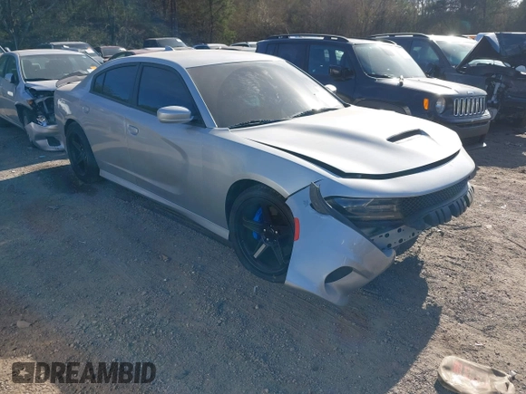 2021 Dodge Charger Scat Pack with VIN 2C3CDXGJ5MH539860, listed as a IAAI auction lot 41683146 with 21,361 mi miles and . Bid and sale history available at DreamBid. Image 1.