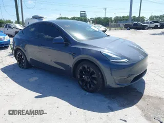 2020 Tesla Model Y Long Range with VIN 5YJYGDEF2LF001725, listed as a IAAI auction lot 41954780 with 70,284 mi miles and . Bid and sale history available at DreamBid. Image 1.