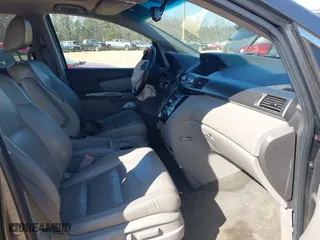 2012 Honda Odyssey EX-L with VIN 5FNRL5H64CB066240, listed as a IAAI auction lot 41792321 with 186,895 mi miles. Bid and sale history available at carsss.com. Image 5.