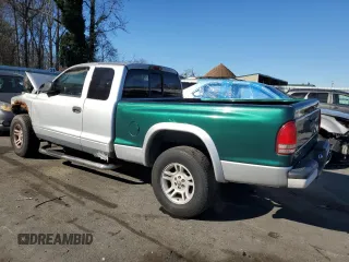 2004 Dodge Dakota Sport with VIN 1D7HG32N44S540671, listed as a Copart auction lot 80000954 with 140,475 mi miles and Salvage Title. Bid and sale history available at carsss.com. Image 2.