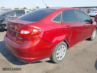2013 Ford Fiesta SE with VIN 3FADP4BJ8DM194652, listed as a IAAI auction lot 39677371 with 74,261 mi miles. Bid and sale history available at carsss.com. Image 4.