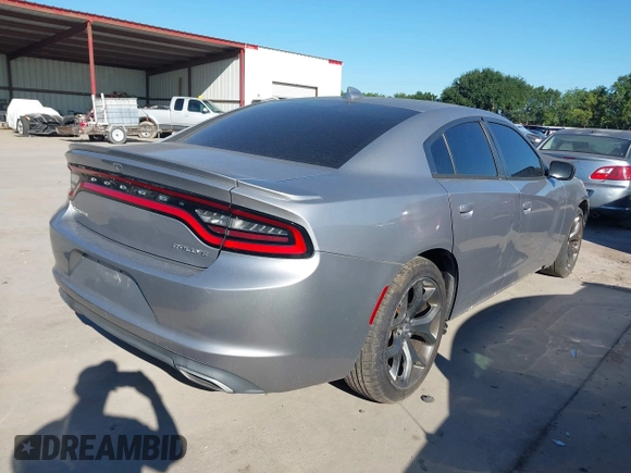 2015 Dodge Charger SXT with VIN 2C3CDXHG8FH884080, listed as a IAAI auction lot 42230385 with 151,948 mi miles and . Bid and sale history available at DreamBid. Image 4.