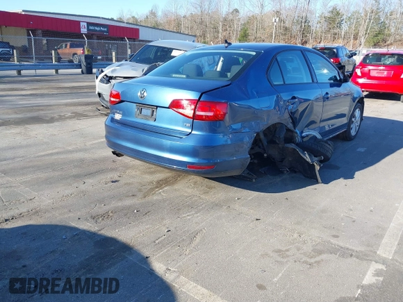 2015 Volkswagen Jetta SE z VIN 3VWD07AJ4FM285676, wystawiony jako IAAI lot #41787061 z przebiegiem 142 537 mil mil oraz . Historia ofert i sprzedaży dostępna na DreamBid. Obrazek 4.