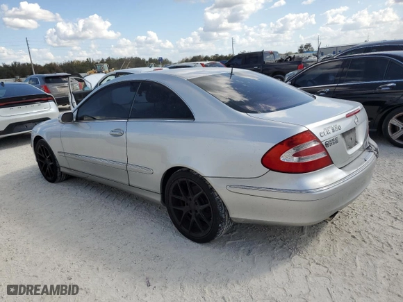 2003 Mercedes-Benz CLK-Class 3.2L with VIN WDBTJ65J63F050559, listed as a Copart auction lot 77650564 with 218,619 mi miles and Clean Title. Bid and sale history available at carsss.com. Image 2.