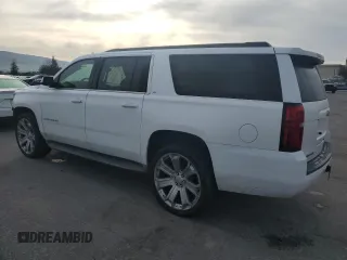 2015 Chevrolet Suburban LT with VIN 1GNSCJKC2FR601516, listed as a Copart auction lot 48480595 with 176,875 mi miles and Salvage title. Bid and sale history available at DreamBid. Image 2.