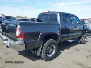 2014 Toyota Tacoma with VIN 3TMLU4EN0EM145573, listed as a IAAI auction lot 41621189 with 178,281 mi miles. Bid and sale history available at carsss.com. Image 4.