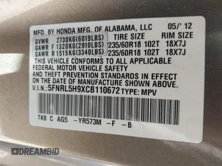 2012 Honda Odyssey Touring with VIN 5FNRL5H9XCB110672, listed as a IAAI auction lot 41826895 with 159,927 mi miles. Bid and sale history available at carsss.com. Image 9.