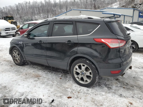 2015 Ford Escape Titanium with VIN 1FMCU9J99FUB17897, listed as a Copart auction lot 88105025 with 112,936 mi miles and Salvage Title. Bid and sale history available at carsss.com. Image 2.