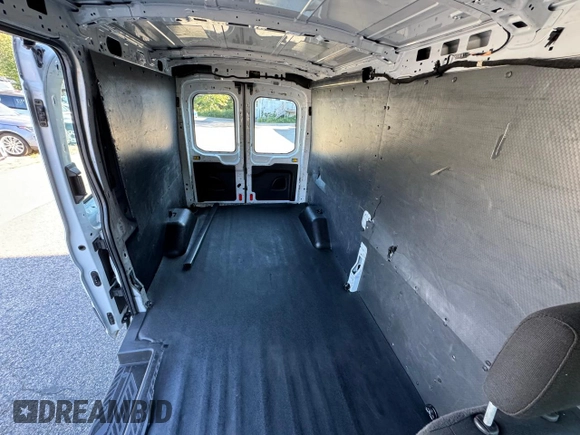 2015 Ford Transit Cargo with VIN 1FTNE2CM4FKA17642, listed as a Copart auction lot 71286284 with 664,494 mi miles and Clean Title. Bid and sale history available at carsss.com. Image 6.