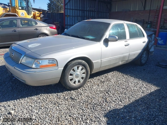 2005 Mercury Grand Marquis LS Premium with VIN 2MEFM75W05X636896, listed as a IAAI auction lot 41636318 with 182,257 mi miles. Bid and sale history available at carsss.com. Image 17.