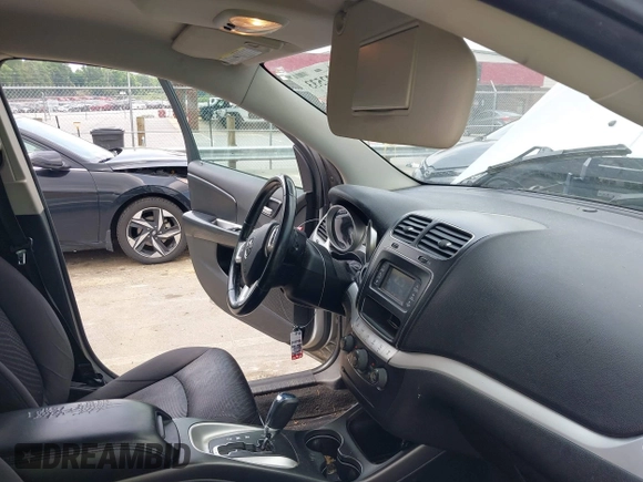 2012 Dodge Journey SXT z VIN 3C4PDCBGXCT324756, wystawiony jako IAAI lot #42422533 z przebiegiem 241 934 mil mil oraz . Historia ofert i sprzedaży dostępna na DreamBid. Obrazek 5.
