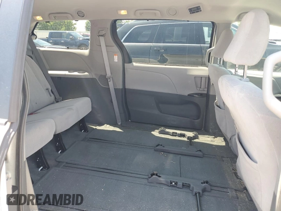 2017 Toyota Sienna LE with VIN 5TDJZ3DC0HS173865, listed as a Copart auction lot 63490865 with 173,078 mi miles and Clean title. Bid and sale history available at DreamBid. Image 11.