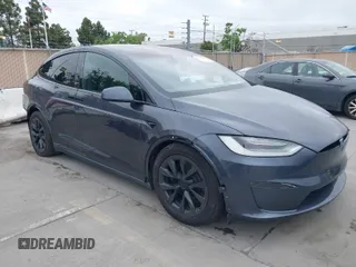 2022 Tesla Model X Plaid with VIN 7SAXCBE6XNF337687, listed as a IAAI auction lot 42035097 with 18,756 mi miles and . Bid and sale history available at DreamBid. Image 1.