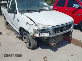 2003 Ford F-150 XL with VIN 1FTRX17243KA96403, listed as a IAAI auction lot 42017173 with 195,120 mi miles. Bid and sale history available at carsss.com. Image 6.