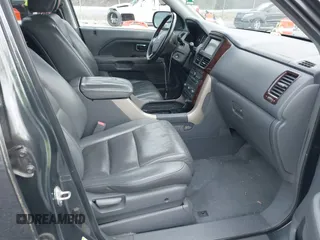 2006 Honda Pilot EX-L with VIN 2HKYF18746H558986, listed as a IAAI auction lot 41875118 with 207,058 mi miles and . Bid and sale history available at DreamBid. Image 5.