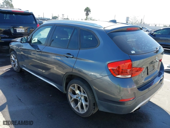 2014 BMW X1 xDrive28i with VIN WBAVL1C57EVY23722, listed as a IAAI auction lot 41839543 with 121,742 mi miles. Bid and sale history available at carsss.com. Image 3.