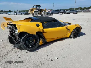2005 Lotus Elise z VIN SCCPC11105HL30103, wystawiony jako Copart lot #87713445 z przebiegiem Nie podano mil oraz Szkody całkowita. Historia ofert i sprzedaży dostępna na DreamBid. Obrazek 3.