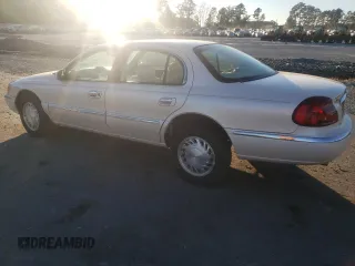 1998 Lincoln Continental with VIN 1LNFM97V3WY647762, listed as a Copart auction lot 77062294 with 153,553 mi miles and Salvage Title. Bid and sale history available at carsss.com. Image 2.
