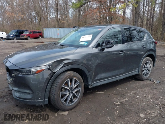 2018 Mazda CX-5 Grand Touring with VIN JM3KFBDM6J0388540, listed as a IAAI auction lot 41963726 with 103,148 mi miles. Bid and sale history available at carsss.com. Image 6.
