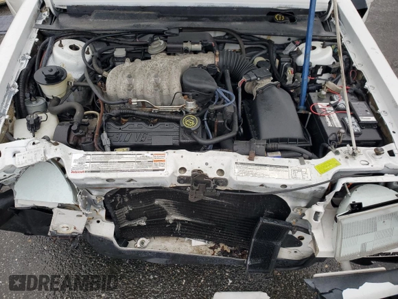 1992 Mercury Topaz GS z VIN 2MEPM36U1NB611321, wystawiony jako Copart lot #56950595 z przebiegiem 54 164 mil mil oraz Szkoda całkowita • Salvage title. Historia ofert i sprzedaży dostępna na DreamBid. Obrazek 11.