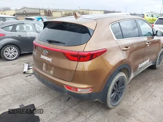 2018 Kia Sportage LX with VIN KNDPMCAC3J7422785, listed as a IAAI auction lot 41869603 with 84,378 mi miles. Bid and sale history available at carsss.com. Image 4.