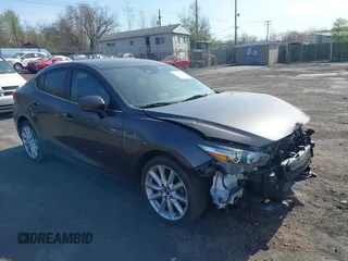 2017 Mazda 3 Touring z VIN 3MZBN1V70HM130081, wystawiony jako IAAI lot #42091430 z przebiegiem 114 480 mil mil oraz . Historia ofert i sprzedaży dostępna na DreamBid. Obrazek 1.