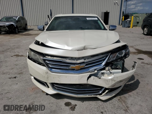2014 Chevrolet Impala LTZ with VIN 2G1155S39E9316657, listed as a Copart auction lot 52232375 with 122,512 mi miles and Salvage Title. Bid and sale history available at DreamBid. Image 5.