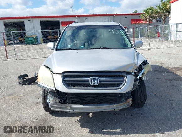 2003 Honda Pilot EX with VIN 2HKYF18603H504829, listed as a IAAI auction lot 42083247 with 247,429 mi miles and . Bid and sale history available at carsss.com. Image 12.