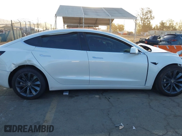 2020 Tesla Model 3 Performance with VIN 5YJ3E1EC1LF602516, listed as a IAAI auction lot 41841216 with 28,967 mi miles and . Bid and sale history available at DreamBid. Image 13.