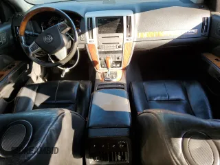2009 Cadillac STS AWD with VIN 1G6DD67VX90137540, listed as a Copart auction lot 42062184 with 153,969 mi miles and Clean Title. Bid and sale history available at DreamBid. Image 8.