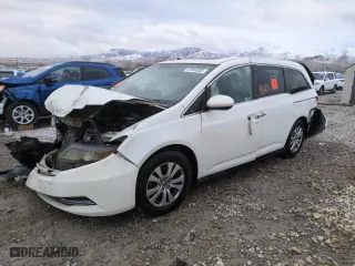 2014 Honda Odyssey EX-L with VIN 5FNRL5H67EB067093, listed as a Copart auction lot 87693205 with NaN miles and Salvage Title. Bid and sale history available at carsss.com. Image 1.
