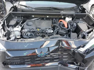 2023 Toyota RAV4 Hybrid LE with VIN JTMLWRFV7PD204946, listed as a Copart auction lot 51330055 with 10,560 mi miles and Salvage Title. Bid and sale history available at carsss.com. Image 12.