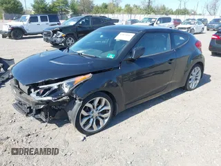 2013 Hyundai Veloster w/Gray Int with VIN KMHTC6AD4DU131242, listed as a IAAI auction lot 42074517 with 76,713 mi miles and . Bid and sale history available at DreamBid. Image 17.