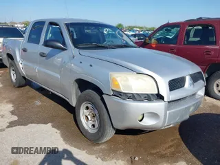 2007 Mitsubishi Raider LS with VIN 1Z7HC28K57S161586, listed as a IAAI auction lot 41864742 with 212,817 mi miles. Bid and sale history available at carsss.com. Image 1.