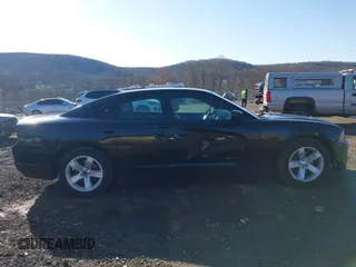 2014 Dodge Charger SE with VIN 2C3CDXBG5EH104852, listed as a IAAI auction lot 41866085 with 170,040 mi miles and . Bid and sale history available at carsss.com. Image 13.