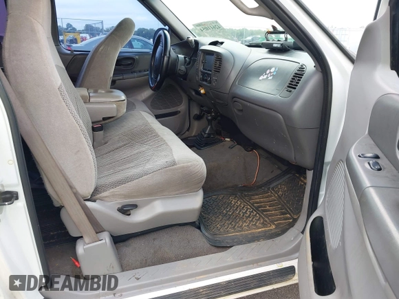 1999 Ford F-150 XL с VIN 1FTRX18L3XNA50864, выставлен на аукционе IAAI как лот 42611054 с пробегом 244 419 миль миль и . История ставок и продаж доступна на DreamBid. Изображение 5.