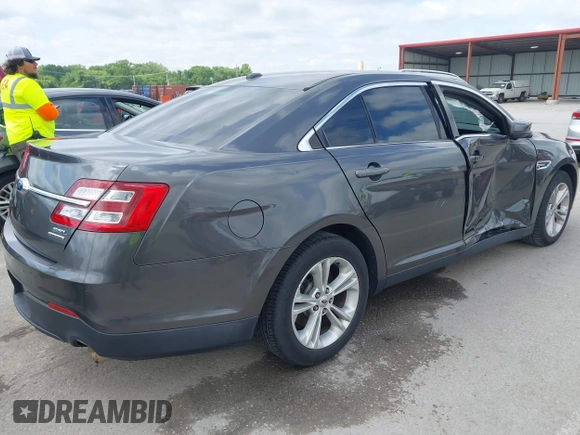 2015 Ford Taurus SEL with VIN 1FAHP2E83FG175051, listed as a IAAI auction lot 42357517 with 200,033 mi miles and . Bid and sale history available at DreamBid. Image 4.