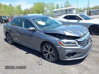 2021 Volkswagen Passat SE z VIN 1VWSA7A39MC011507, wystawiony jako IAAI lot #42160879 z przebiegiem 82 639 mil mil oraz . Historia ofert i sprzedaży dostępna na DreamBid. Obrazek 1.