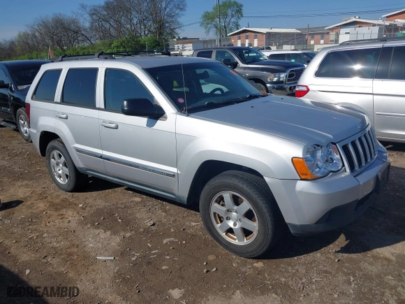 2010 Jeep Grand Cherokee Laredo with VIN 1J4PR4GK5AC161442, listed as a IAAI auction lot 41939994 with 137,376 mi miles. Bid and sale history available at carsss.com. Image 1.