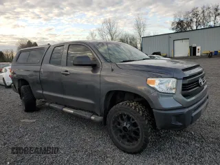 2015 Toyota Tundra 4WD Truck SR with VIN 5TFUM5F15FX063047, listed as a Copart auction lot 87409124 with 122,877 mi miles and Salvage Title. Bid and sale history available at carsss.com. Image 4.