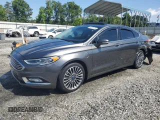 2017 Ford Fusion Titanium z VIN 3FA6P0SU0HR238891, wystawiony jako Copart lot #61381675 z przebiegiem 66 002 mil mil oraz Szkoda całkowita • Salvage title. Historia ofert i sprzedaży dostępna na DreamBid. Obrazek 1.