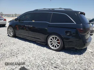2014 Honda Odyssey Touring with VIN 5FNRL5H97EB016624, listed as a Copart auction lot 53444645 with 244,126 mi miles and Salvage Title. Bid and sale history available at DreamBid. Image 2.