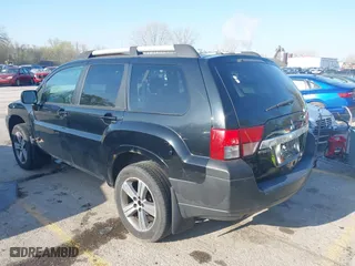 2011 Mitsubishi Endeavor SE with VIN 4A4JN3AS0BE017337, listed as a IAAI auction lot 41973642 with 182,584 mi miles. Bid and sale history available at carsss.com. Image 3.