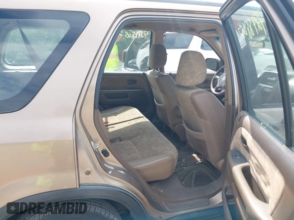 2003 Honda CR-V LX z VIN SHSRD78423U104208, wystawiony jako IAAI lot #42488652 z przebiegiem 214 049 mil mil oraz . Historia ofert i sprzedaży dostępna na DreamBid. Obrazek 8.