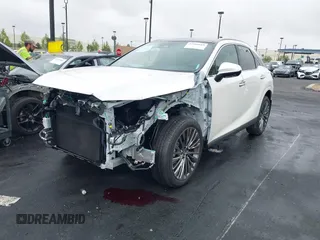 2024 Lexus RX 450h+ Luxury with VIN JTJCJMGA1R2021146, listed as a IAAI auction lot 42204669 with 1,947 mi miles and . Bid and sale history available at DreamBid. Image 2.