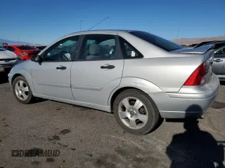 2003 Ford Focus ZTS with VIN 1FAHP38333W146804, listed as a Copart auction lot 88535145 with 142,397 mi miles and Salvage Title. Bid and sale history available at carsss.com. Image 2.