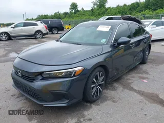 2023 Honda Civic EX with VIN 2HGFE1F73PH312228, listed as a IAAI auction lot 42185408 with 19,339 mi miles and . Bid and sale history available at DreamBid. Image 17.
